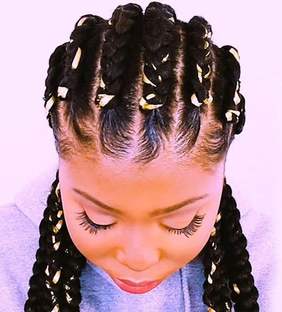 Cornrows with gold embellishments