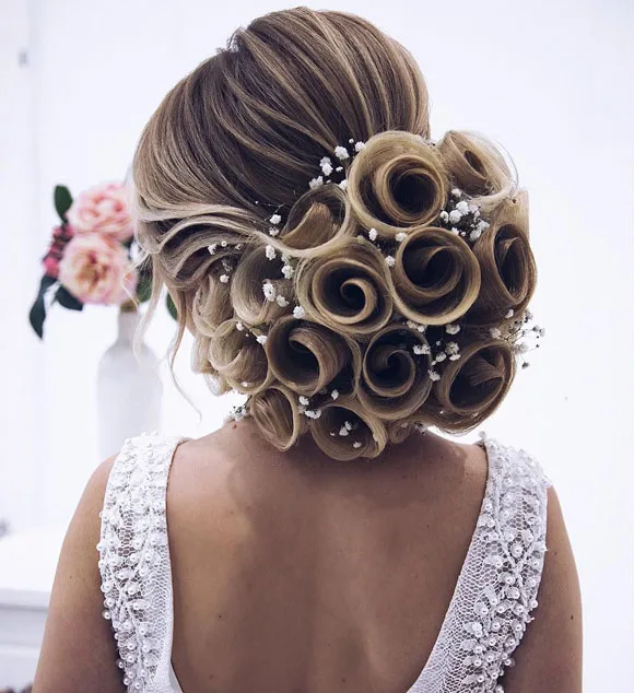 The bouquet bun quinceanera hairstyle for long hair