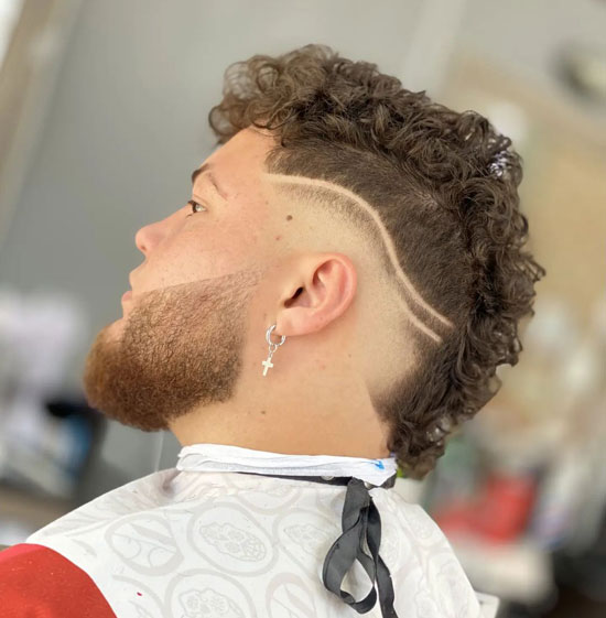 Curly Burst Fade Mohawk with Wave Design