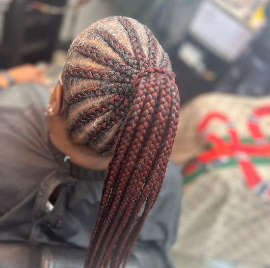 Red Medium Knotless Braids into a Ponytail