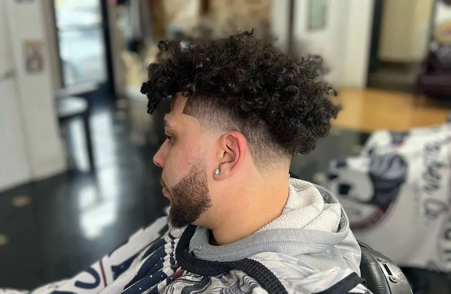 Low Skin Fade Curly Haircut With Disconnected Undercut - VIDEO – Regal  Gentleman