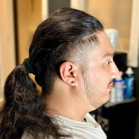 Low Bun Ponytail with Temple Fade