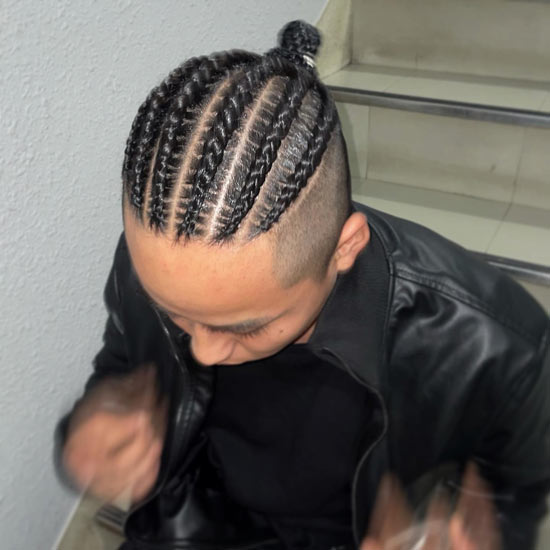 Gleaming Cornrows With Compact Braided Bun